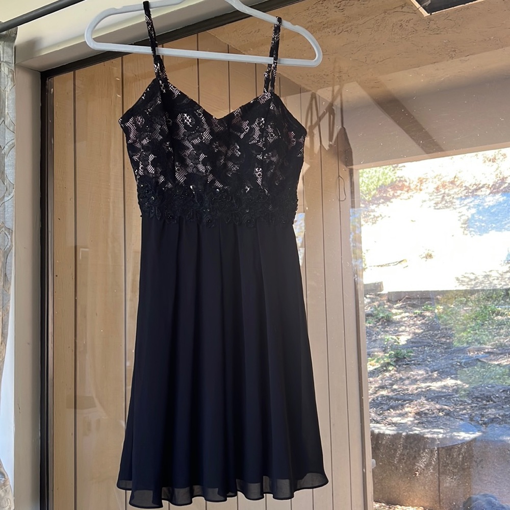 A. Byer black lace mini dress